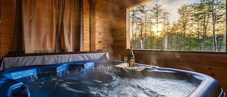 Soak it up with a beautiful view!  Our guests health and safety is important to us. Rest-assured, our hot tub is drained, cleaned, replaced with fresh water, and treated with bromine after every check-out. We also have a cover on top of the hot tub.
