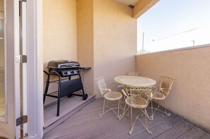 Atrium with Grill and eating area.