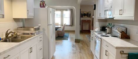 Bright, modern, walk-through kitchen. 