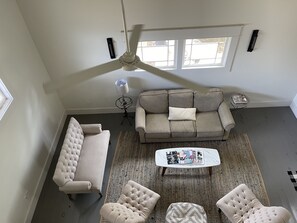 View of living room from the upstairs loft.
