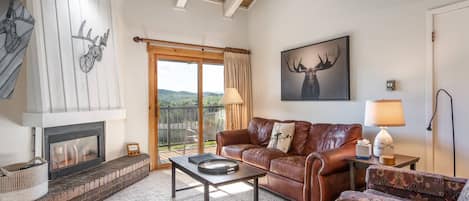 Comfortable living room to watch the game, read a good book or play games with the family in front of the fire.