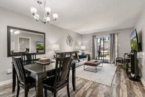 Dining & living room, leading to private patio.