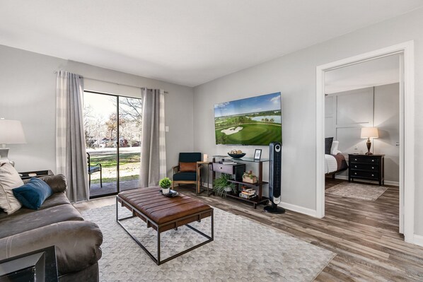 Enjoy the golf course view or your fav shows on the 65" smart tv.