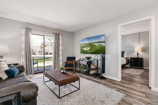 Enjoy the golf course view or your fav shows on the 65" smart tv.