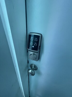 Front Door Entry with private key code unique to guest