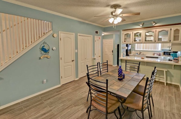 Chair, Furniture, Ceiling Fan, Dining Table, Table