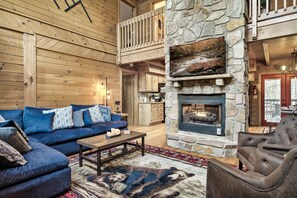 Spread out on the couch in front of the cozy fireplace
