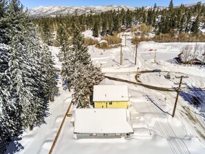 Shuttle stops are right at the corner. Walk with your ski or snowboard !