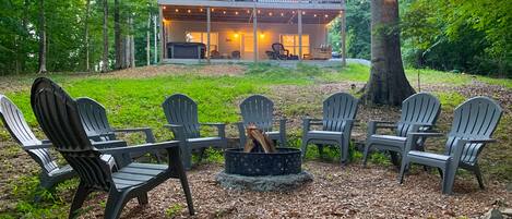 firepit and a view of the back of the house