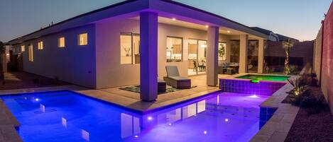 Beautiful, private pool w/oversized hot tub lights up beautifully at night!