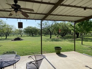View of the firepit off the back porch
