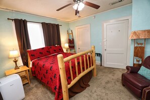 Log House room with queen bed