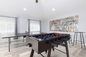 Bar table with two stools.