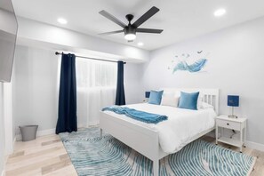 12 inch memory foam Queen bed, touch control, dimmable table lamps with USB ports and AC outlet.