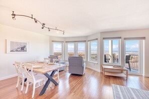 Large bay windows across the entire wall facing the ocean for incredible views