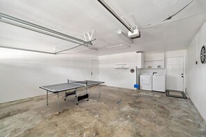 Garage with Ping Pong and Laundry