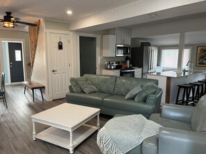 Living Space coming in from back door off deck