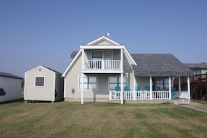 Bay side of "Barn on the Bay' Covered seating to relax in 
