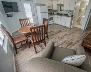 Dining Area, Kitchen, Bathroom, Bedroom, and Living Area