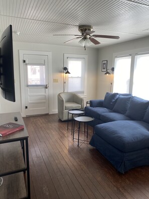 Living room view looking toward front door