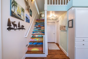 From main house door, to the left is a one-of-a-kind staircase. 