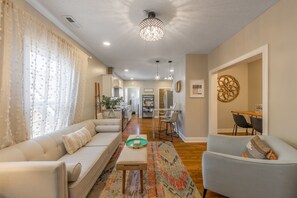 Step into a living room designed for relaxation and connection. 