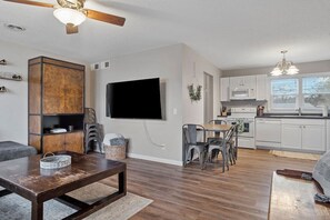 Adjacent to the living area is a dining space, ideal for enjoying delicious home-cooked meals!