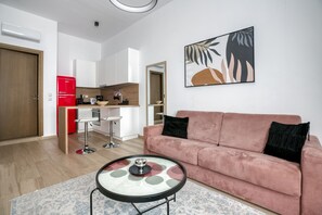 Living room, Sitting area, Dining area, Oven, Stovetop, Kitchen