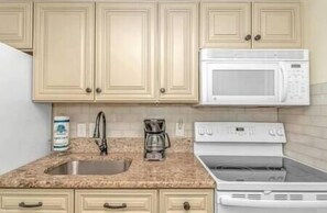 Kitchen Area w/ Ample Cabinet Space