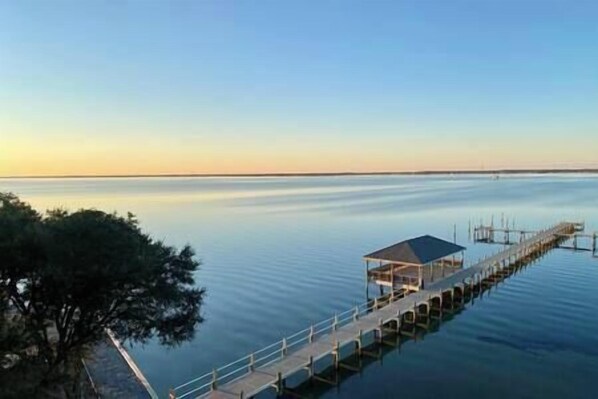 Sound/dock view from balcony at sunset