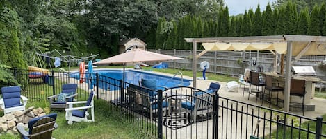 inground pool, firepit, outdoor kitchen