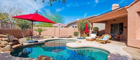 Pool has water feature also has a baja shelf - nice for sitting in beach in pool