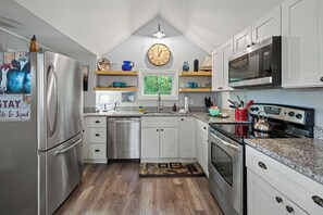 Modern cottage kitchen with cozy charm.