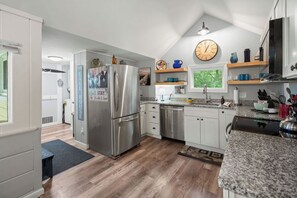 Modern cottage kitchen with cozy charm.