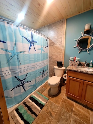 This is the Ocean Oasis bathroom in the master bedroom with a huge tile shower