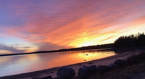 The beautiful beach at the end of Rogers point at sunset