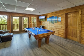 Pool table is in the downstairs game room.