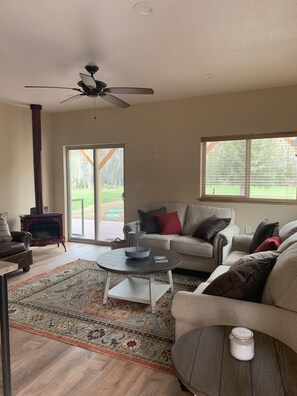 Cozy living room , with sliding door to the spacious back yard. 