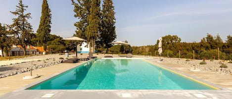 Water, Sky, Plant, Daytime, Property, Swimming Pool, Azure, Nature, Tree, Body Of Water