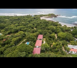 Aerial Pelada beach on right and Guiones on left.