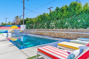 Garden Wall lining the huge backyard with amazing pool, heated!