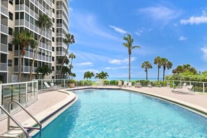 Cool water, bright sun, and green palms: what else do you need?