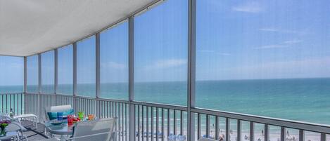 Enjoy a snack on the screened balcony then head down to the private beach
