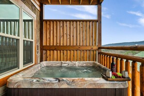 Enjoy breathtaking views from the 6-person hot tub.