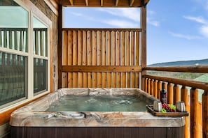 Enjoy breathtaking views from the 6-person hot tub.