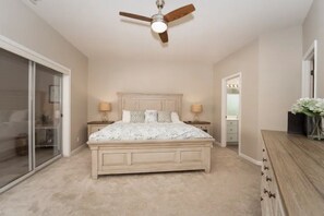 Master bedroom with sliding door to screened in deck