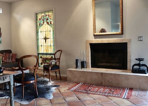 The cozy gas fireplace located in the open concept living/dining area