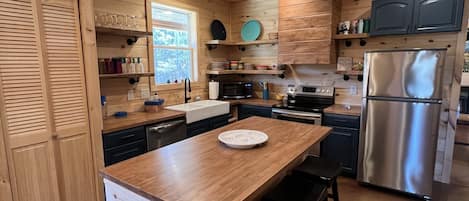 This beautiful kitchen is fully equipped with everything you need to cook!  