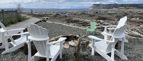 Private fire pit overlooking the bay and Olympic Mountains.