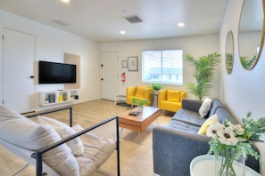 Comfortable living area to relax, watch tv, & plan your next adventure.